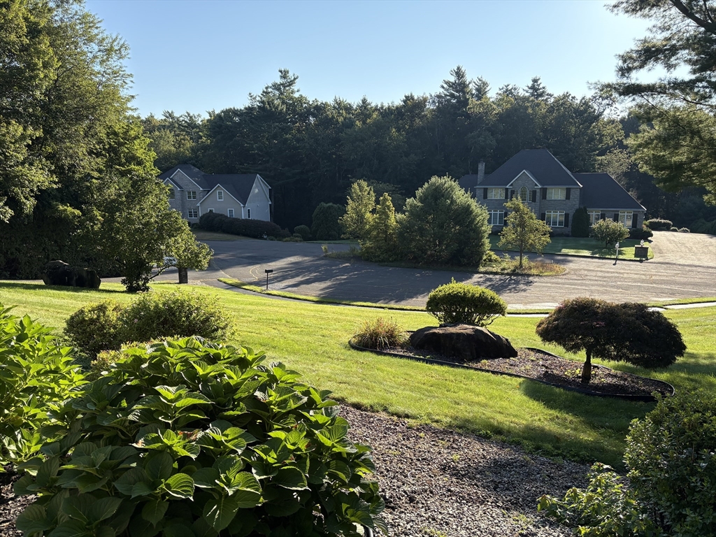 321 Westerly Circle Ludlow, MA 01056 - Photo 36 of 38 a view of a backyard with swimming pool