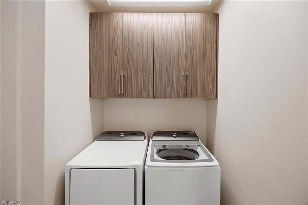 9076 Rialto Street, Unit 62 Naples, FL 34113 - Photo 30 of 50 a utility room with dryer and washer