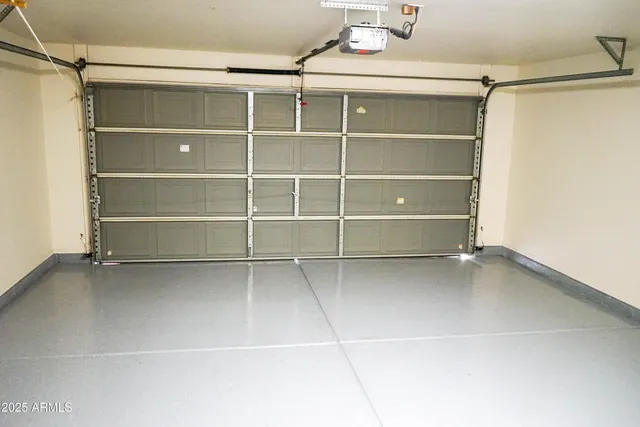 a view of a front door and a yard