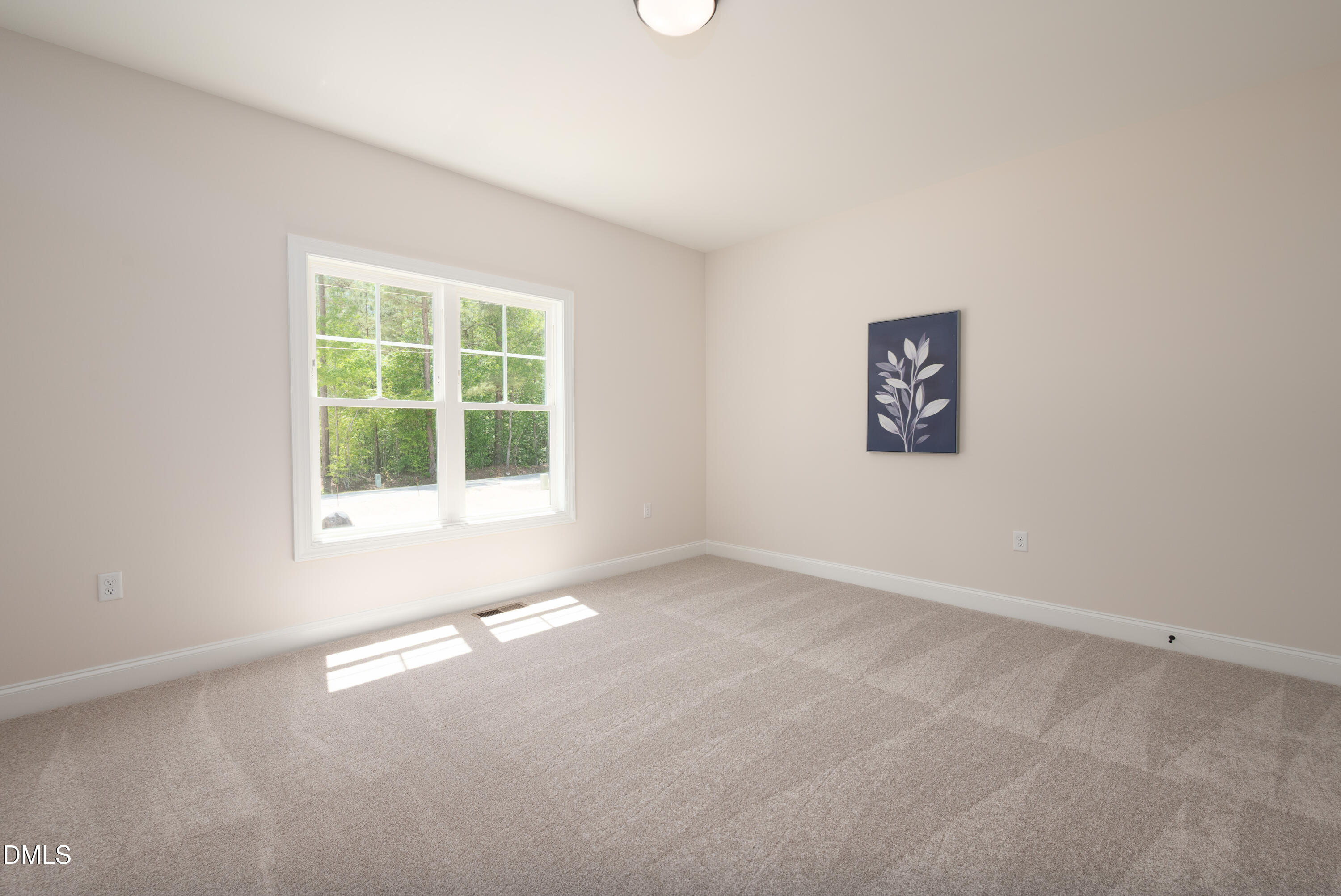 2275 Peachtree Hills Road Spring Hope, NC 27882 - Photo 32 of 43 an empty room with a window