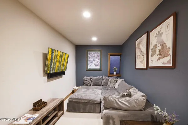 a bedroom with bed and a window