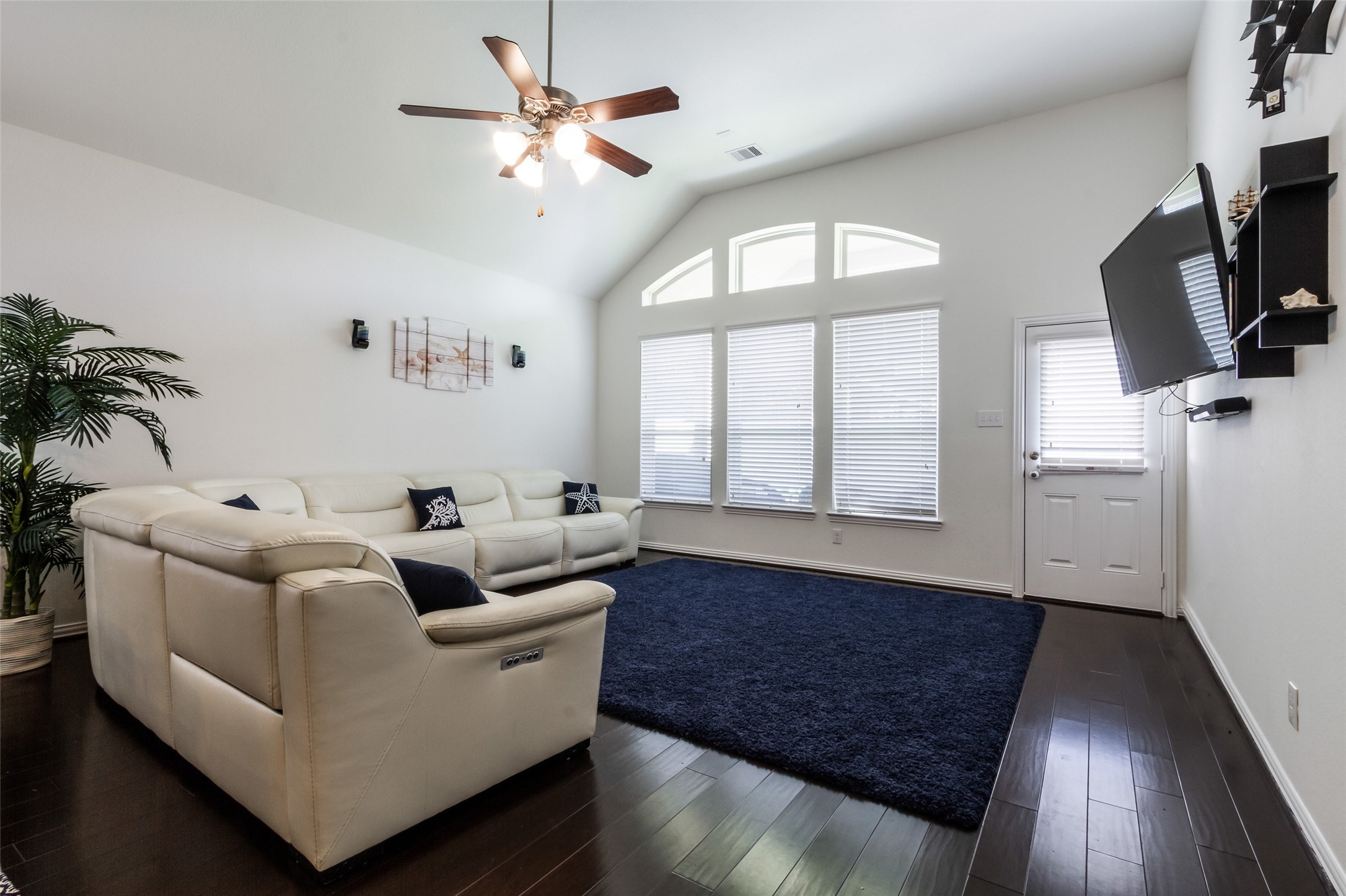 6305 Rotherham Street League City, TX 77573 - Photo 16 of 22 a living room with furniture and a flat screen tv