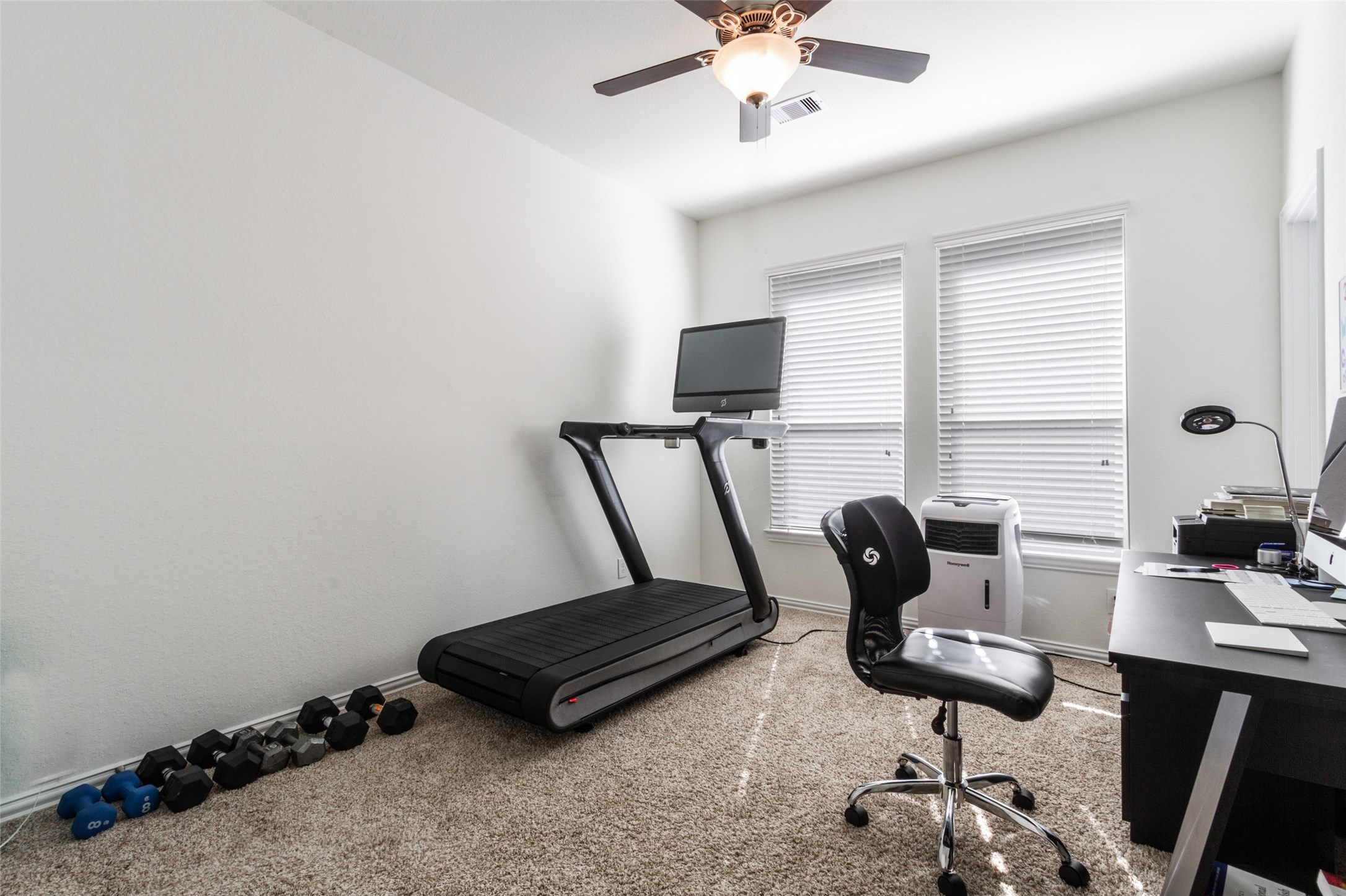 6305 Rotherham Street League City, TX 77573 - Photo 8 of 22 a bedroom with furniture and a window