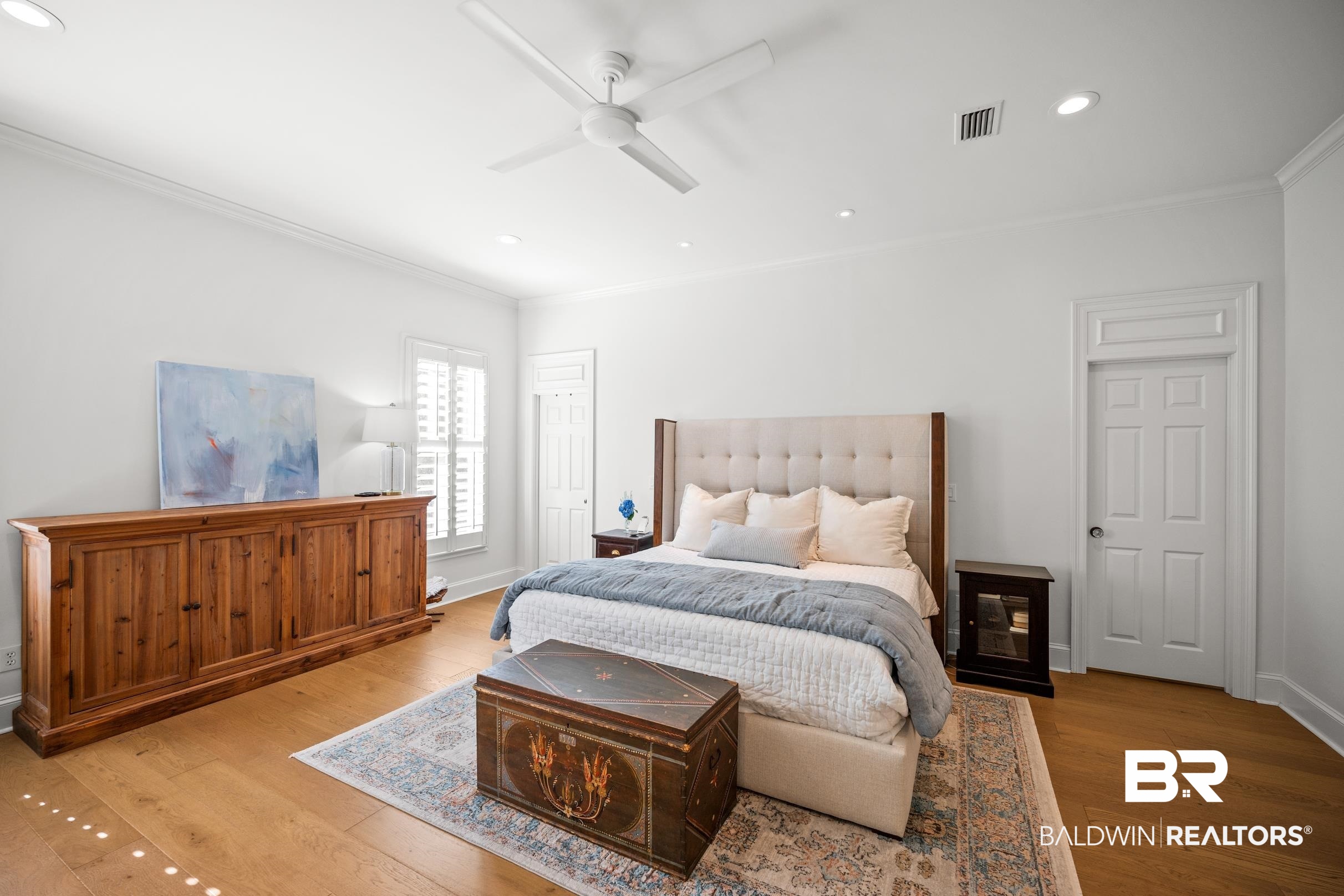 115 Sandy Ford Road Fairhope, AL 36532 - Photo 27 of 47 Bedroom featuring ornamental molding, light wood-style flooring, recessed lighting, and ceiling fan
