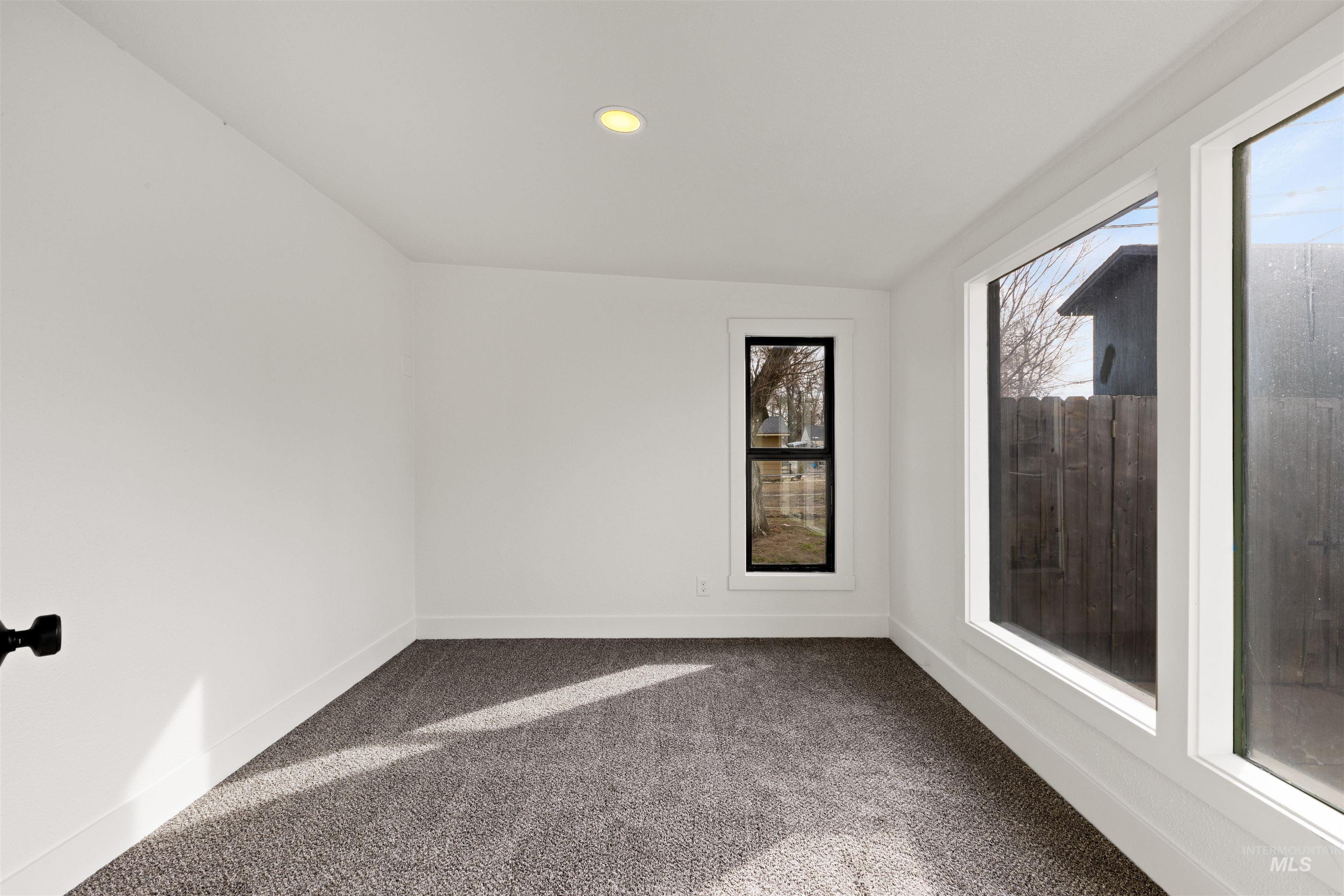 495 South 3rd E Street Mountain Home, ID 83647 - Photo 9 of 46 Unit A 3rd bedroom