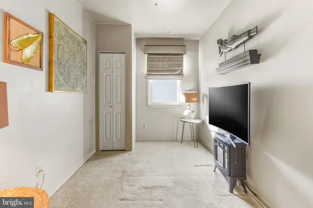 a view of a livingroom with a flat screen tv