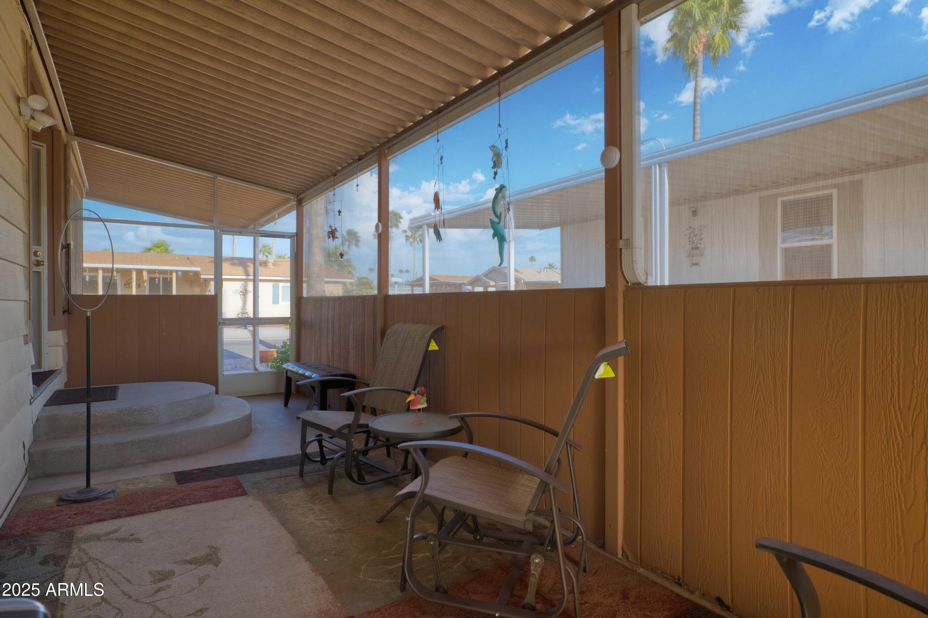 9302 East Broadway Road, Unit 185 Mesa, AZ 85208 - Photo 23 of 24 a building outdoor space with patio furniture