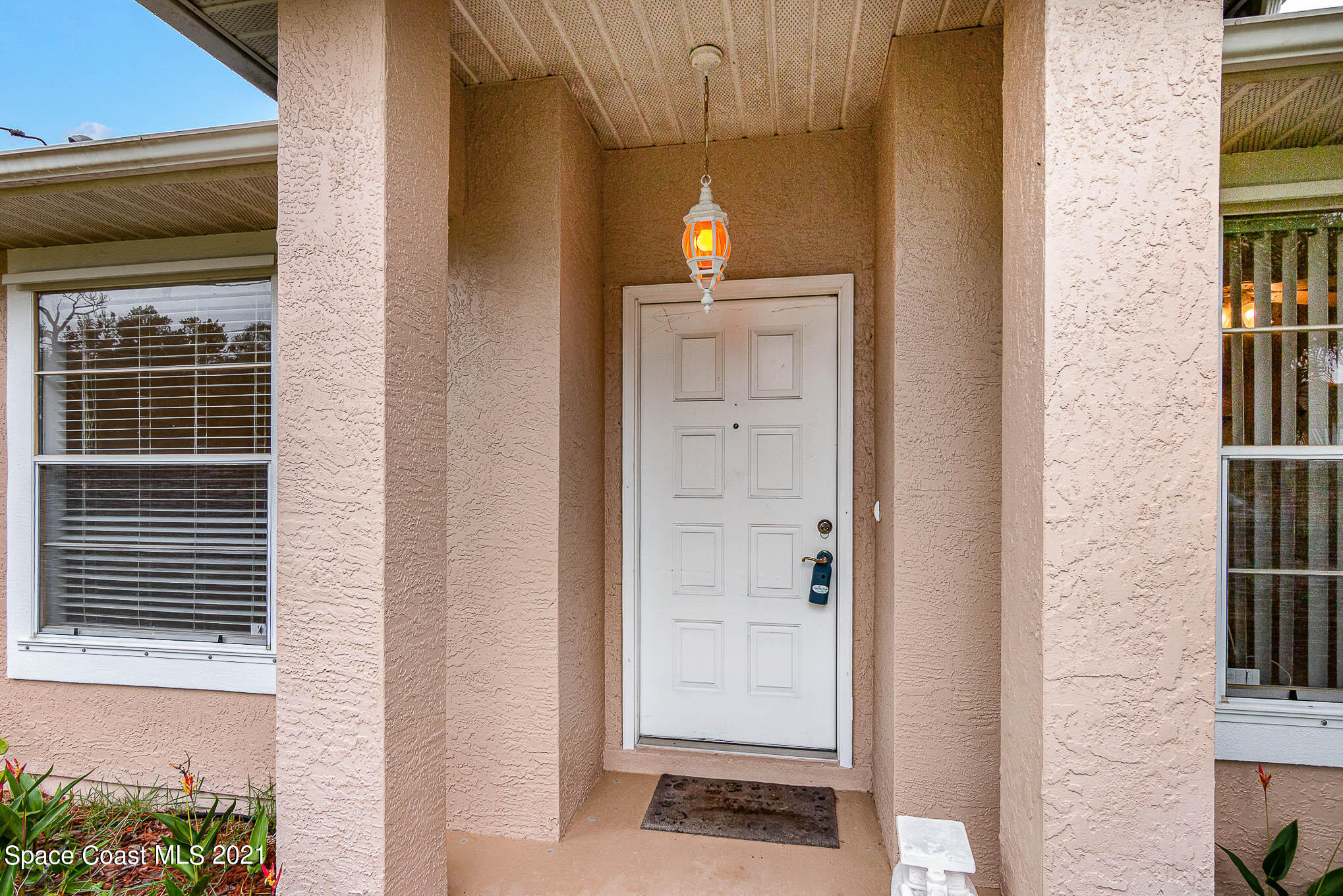 6755 Cairo Road Cocoa, FL 32927 - Photo 2 of 22 a view of a door and a window