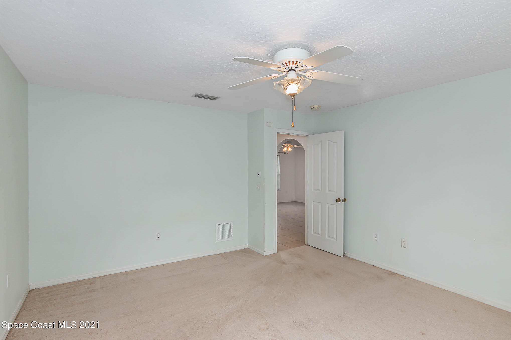 6755 Cairo Road Cocoa, FL 32927 - Photo 12 of 22 wooden floor in an empty room