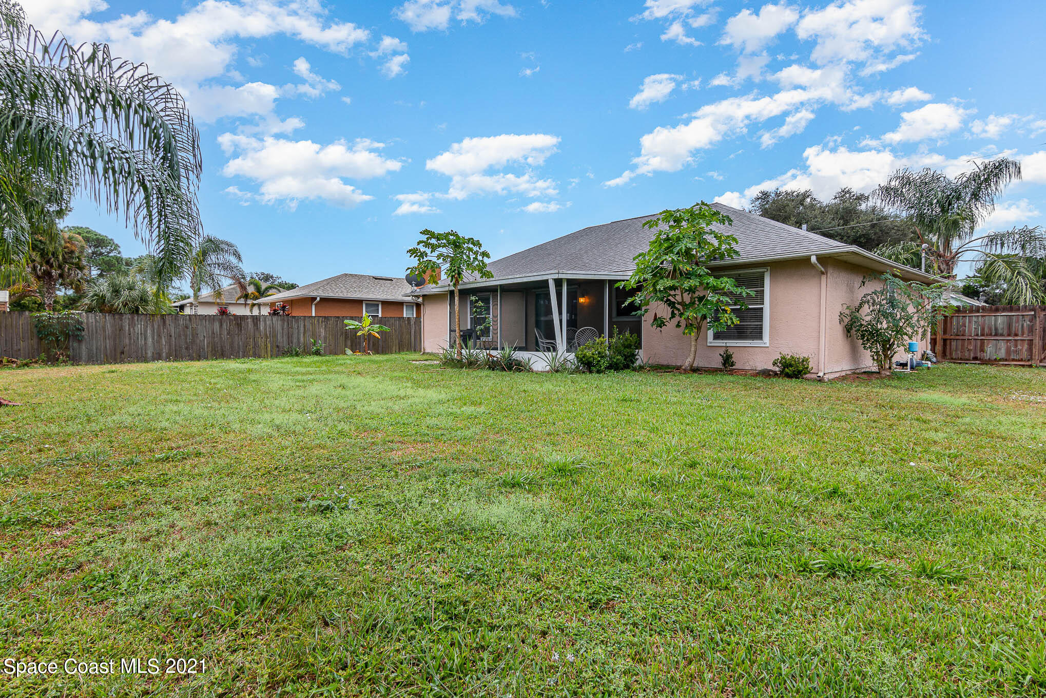 6755 Cairo Road Cocoa, FL 32927 - Photo 21 of 22 a view of a house with a yard