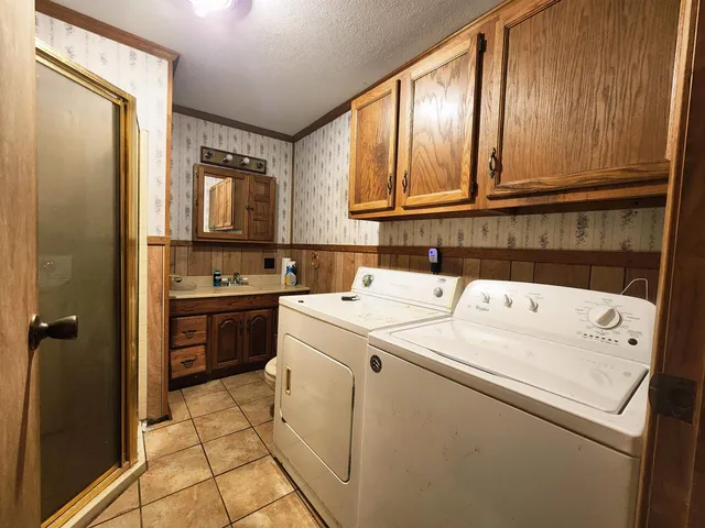 a utility room with dryer and washer