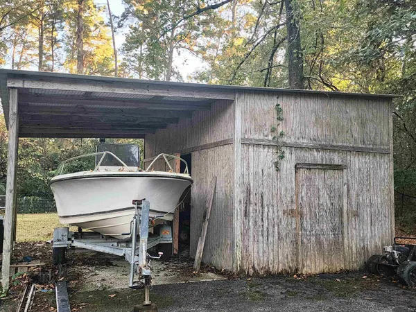 a view of a wooden door of the house