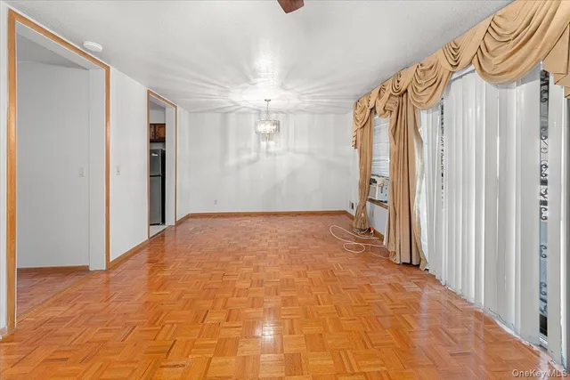a view of a bathroom with a shower and a tub