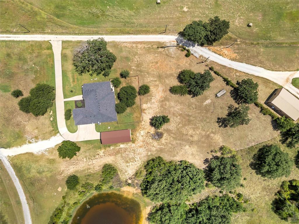 4030 Neri Oaks Court Granbury, TX 76048 - Photo 36 of 40 a view of lake view with wooden floor