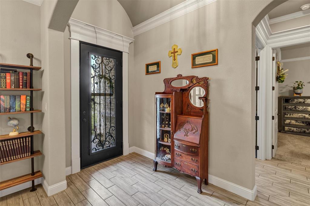 4030 Neri Oaks Court Granbury, TX 76048 - Photo 7 of 40 a view of an entryway with wooden floor