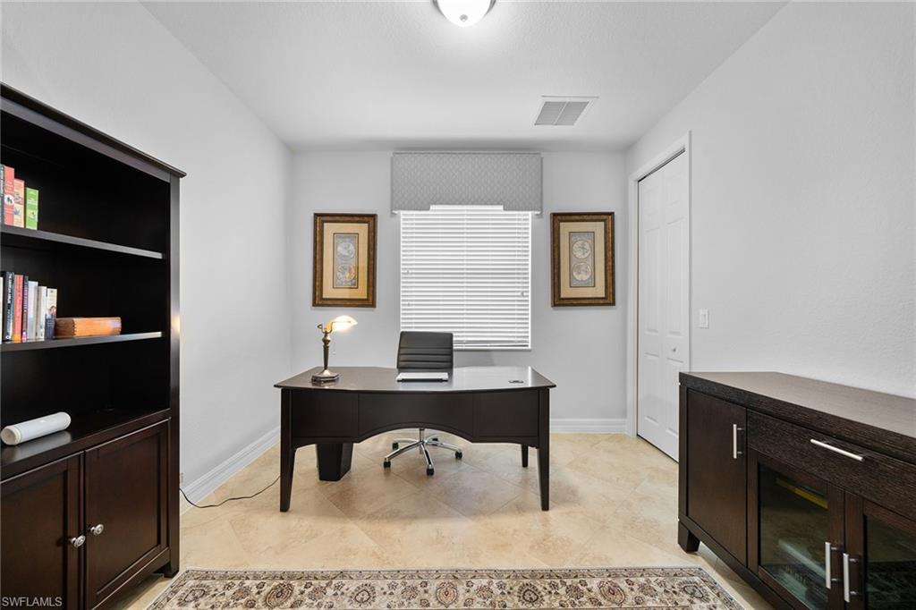 12614 Fenhurst Way Naples, FL 34120 - Photo 29 of 50 a workspace with furniture and window