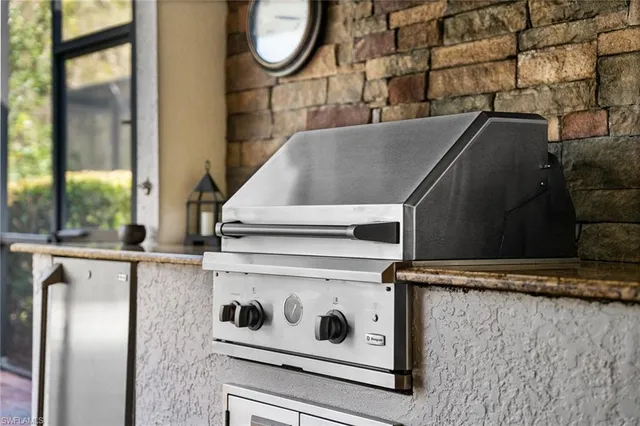 closeup of a stove top oven sitting inside of a kitchen