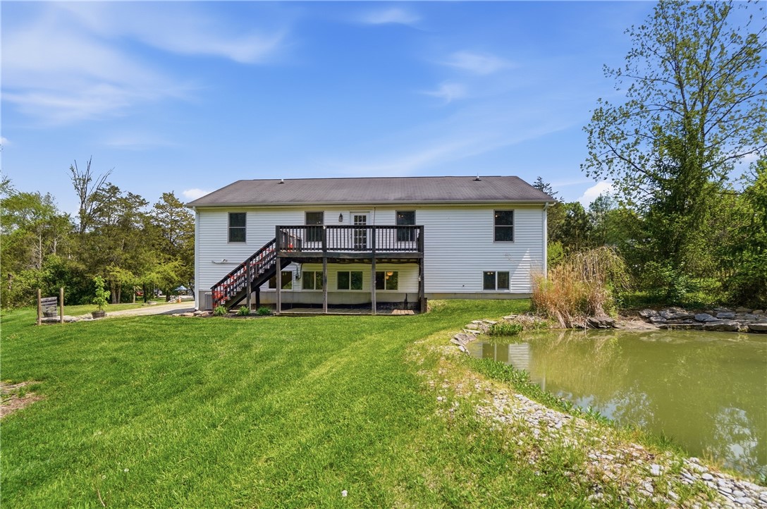 1208 Jarva Lane Springboro, OH 45066 - Photo 69 of 75 This home offers expansive views of a tranquil pond from its generous back deck.