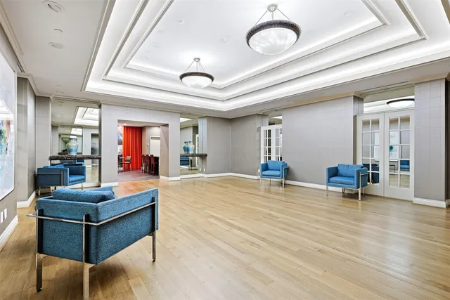 a large kitchen with a table and chairs