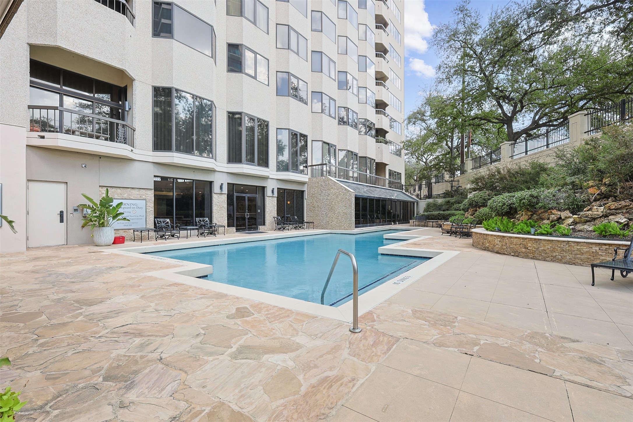 2001 Holcombe Boulevard, Unit 1106 Houston, TX 77030 - Photo 29 of 50 As a resident of The Spires, you will have access to this gorgeous pool, tennis courts, racquetball court, party room, sauna and gym.