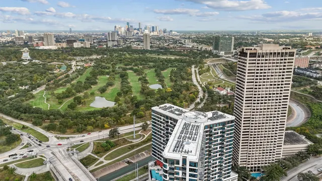 a view of a city with tall buildings