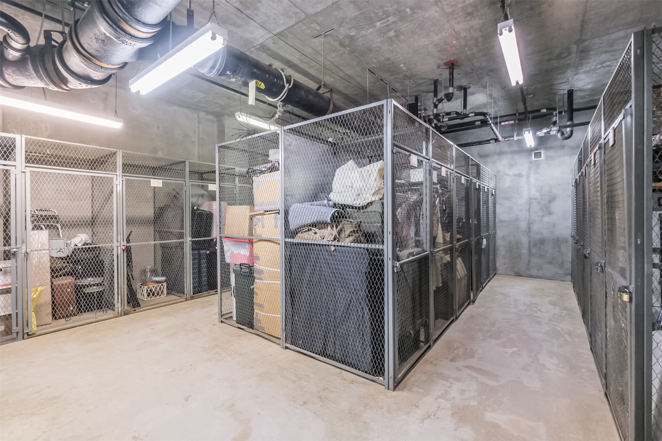 2001 Holcombe Boulevard, Unit 1106 Houston, TX 77030 - Photo 39 of 50 Storage units are located in the basement area of The Spires.