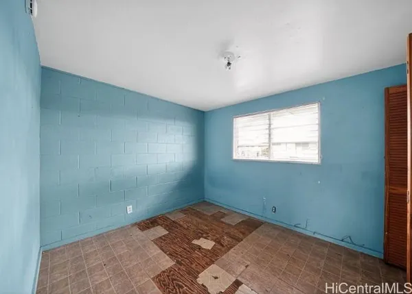 a view of a room that has a window in it