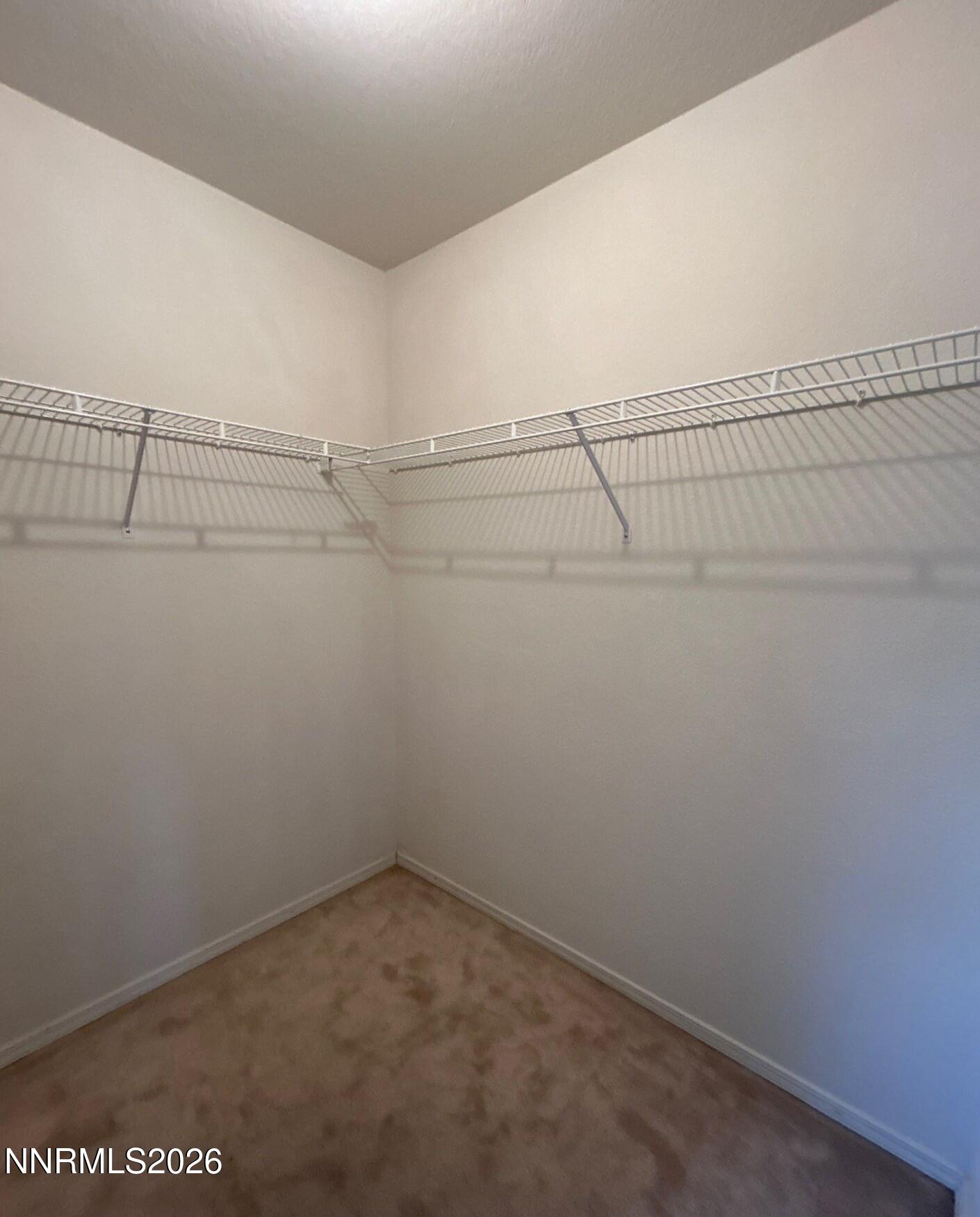 4771 Amber Hill Lane Reno, NV 89523 - Photo 16 of 20 a view of a room with racks on the wall