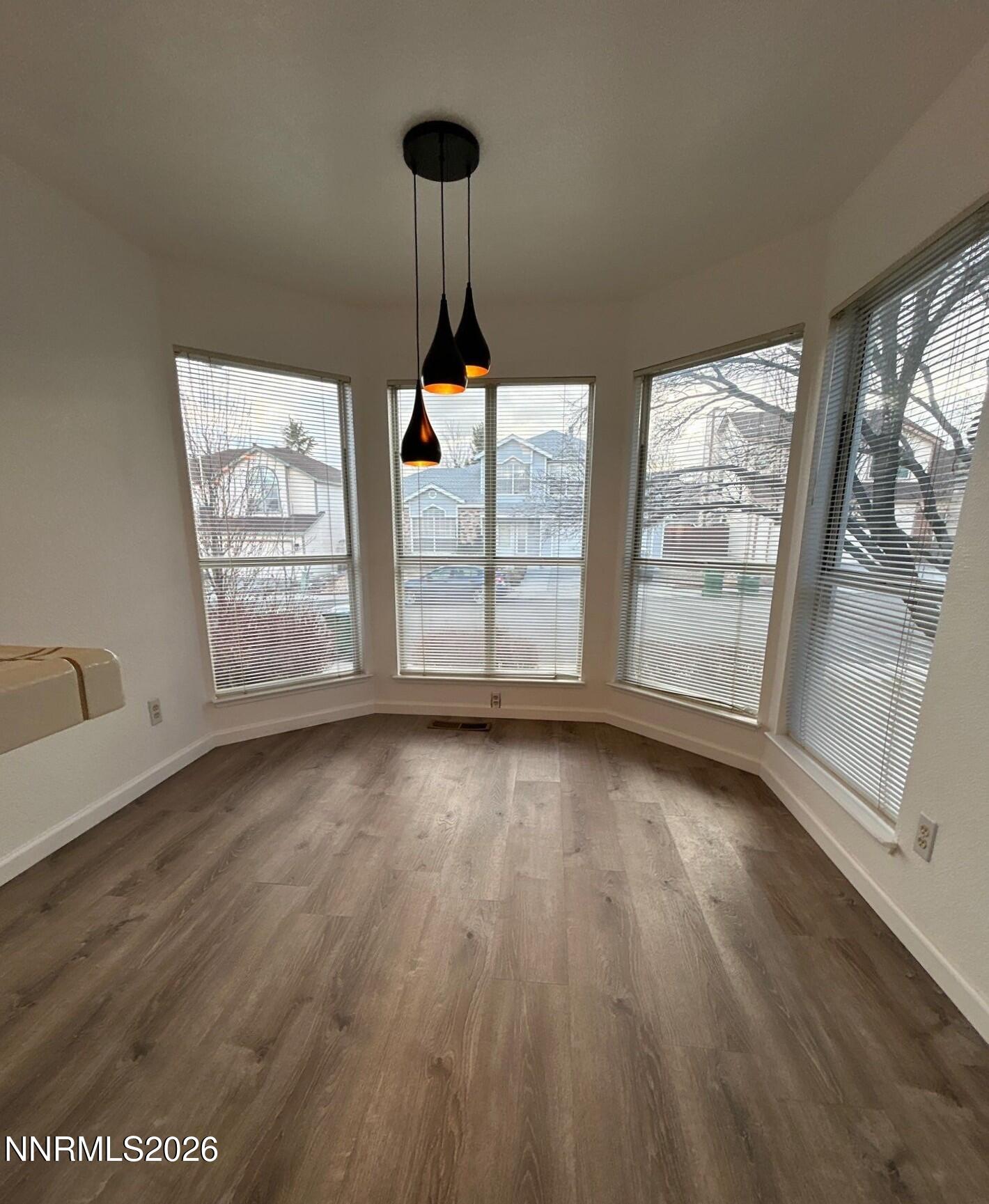 4771 Amber Hill Lane Reno, NV 89523 - Photo 7 of 20 a view of an empty room with a window
