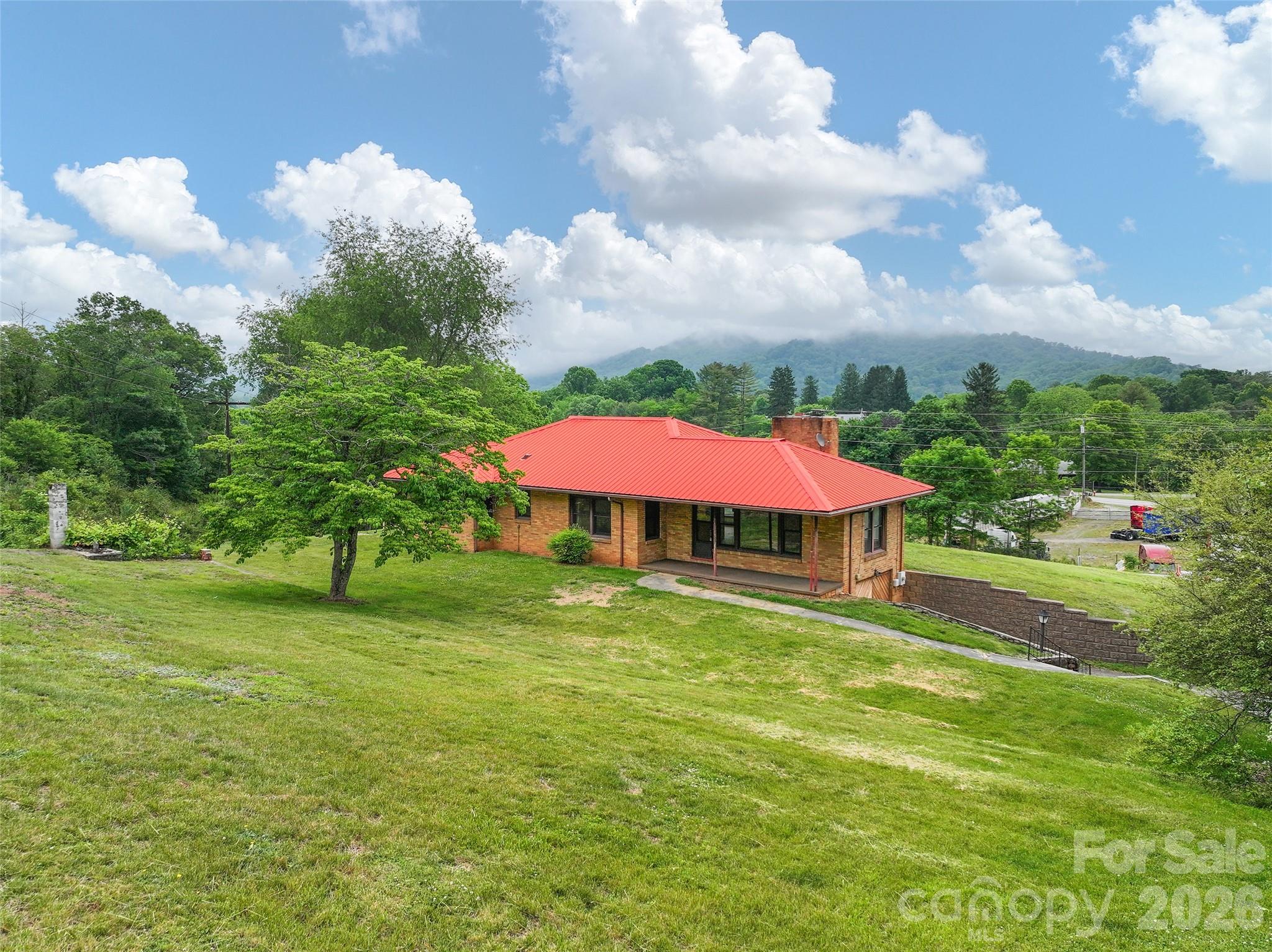 21 Beaverdam Road Canton, NC 28716 - Photo 24 of 24 a view of a house with a yard