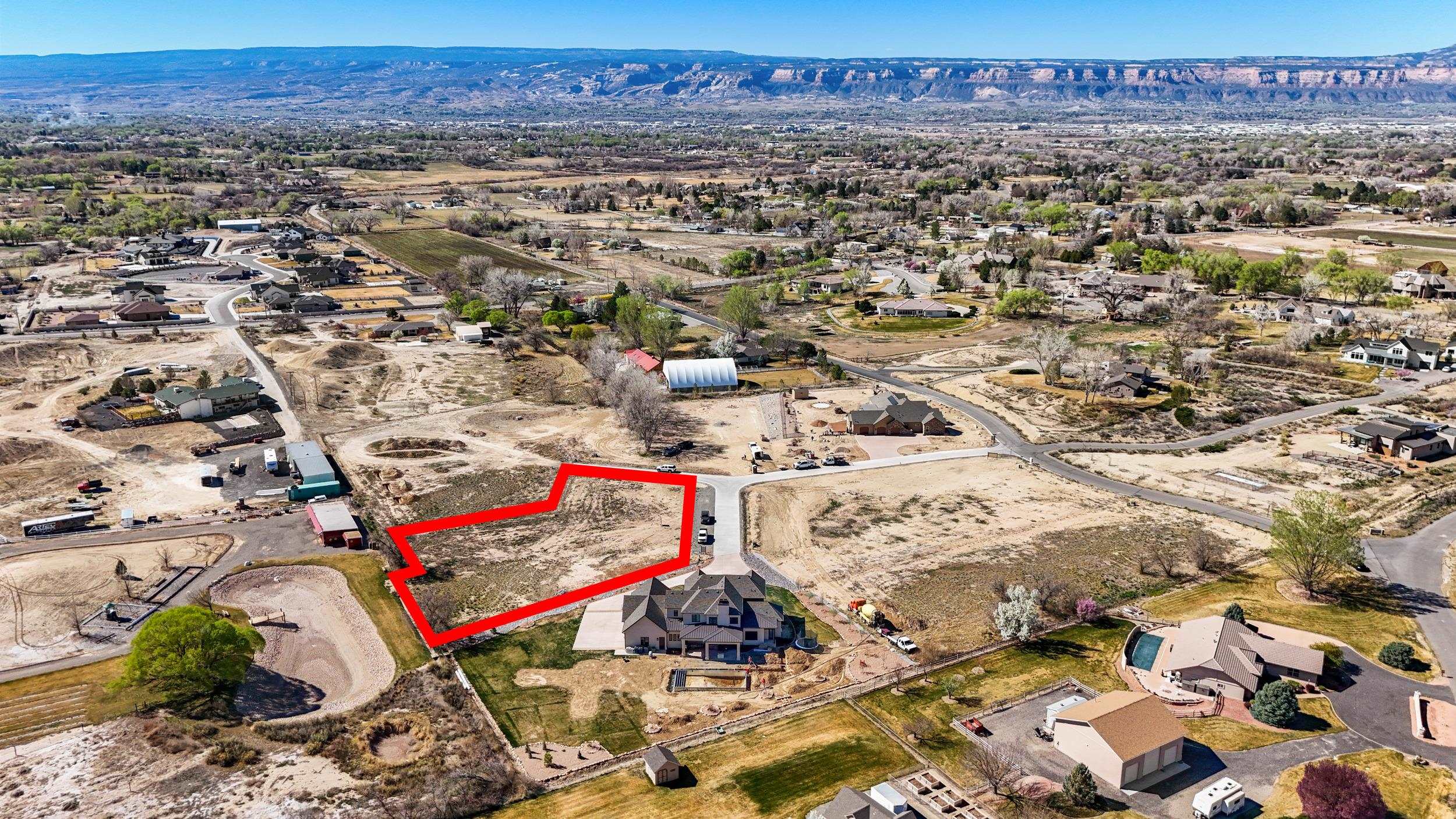 916 25 3/4 Road Grand Junction, CO 81505 - Photo 11 of 11 an aerial view of residential houses with outdoor space