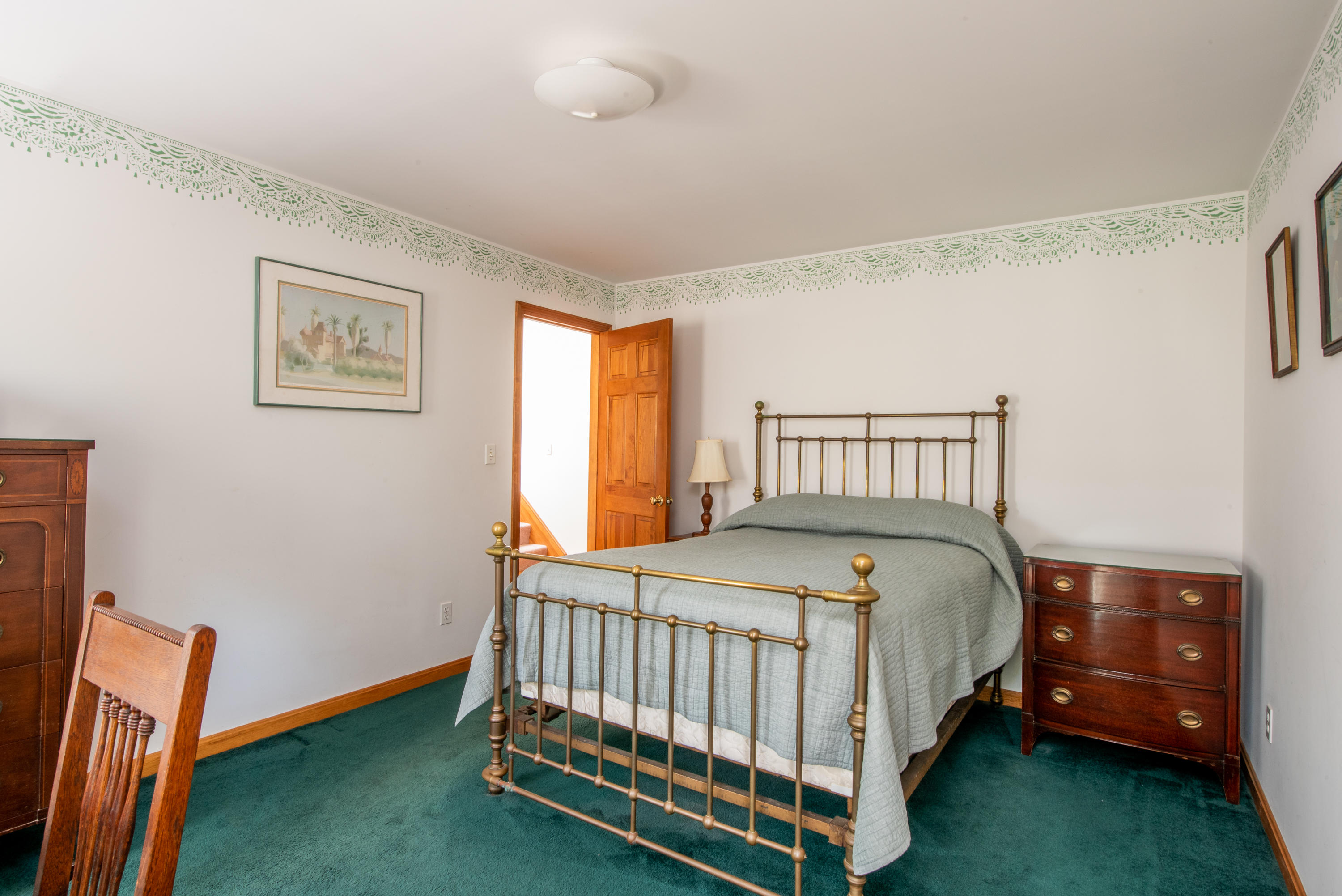 2 River Harbor Road Wellfleet, MA 02667 - Photo 32 of 33 a bed sitting in a bedroom next to a window