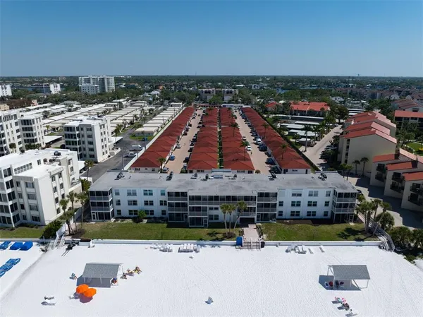 an aerial view of a house with a outdoor space