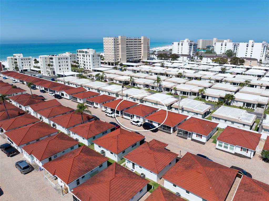 6154 Midnight Pass Road, Unit A05 Sarasota, FL 34242 - Photo 27 of 39 a city view with tall buildings