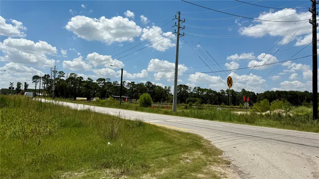 a view of a lake with a building in the background