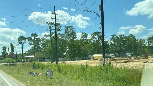 a view of a swimming pool with an outdoor space and seating