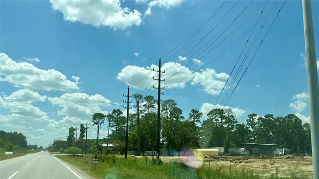 a view of water with tall building