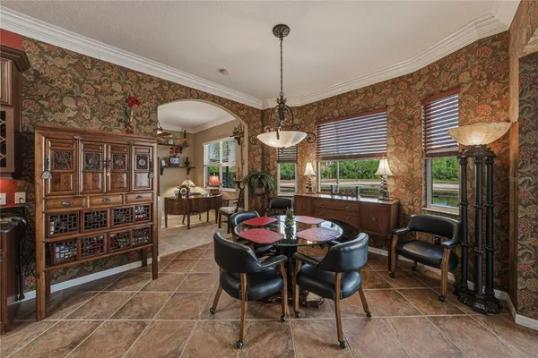 a view of walk in closet with clothes