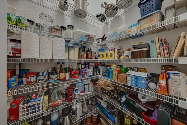 an aerial view of a house with outdoor space and lake view