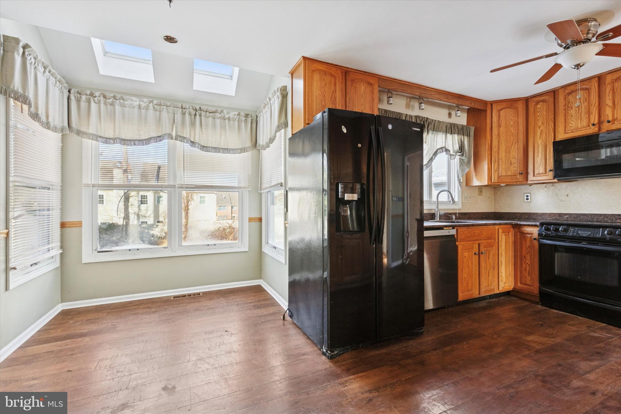 257 Mingo Road Royersford, PA 19468 - Photo 10 of 31 a kitchen with granite countertop a refrigerator stove and oven