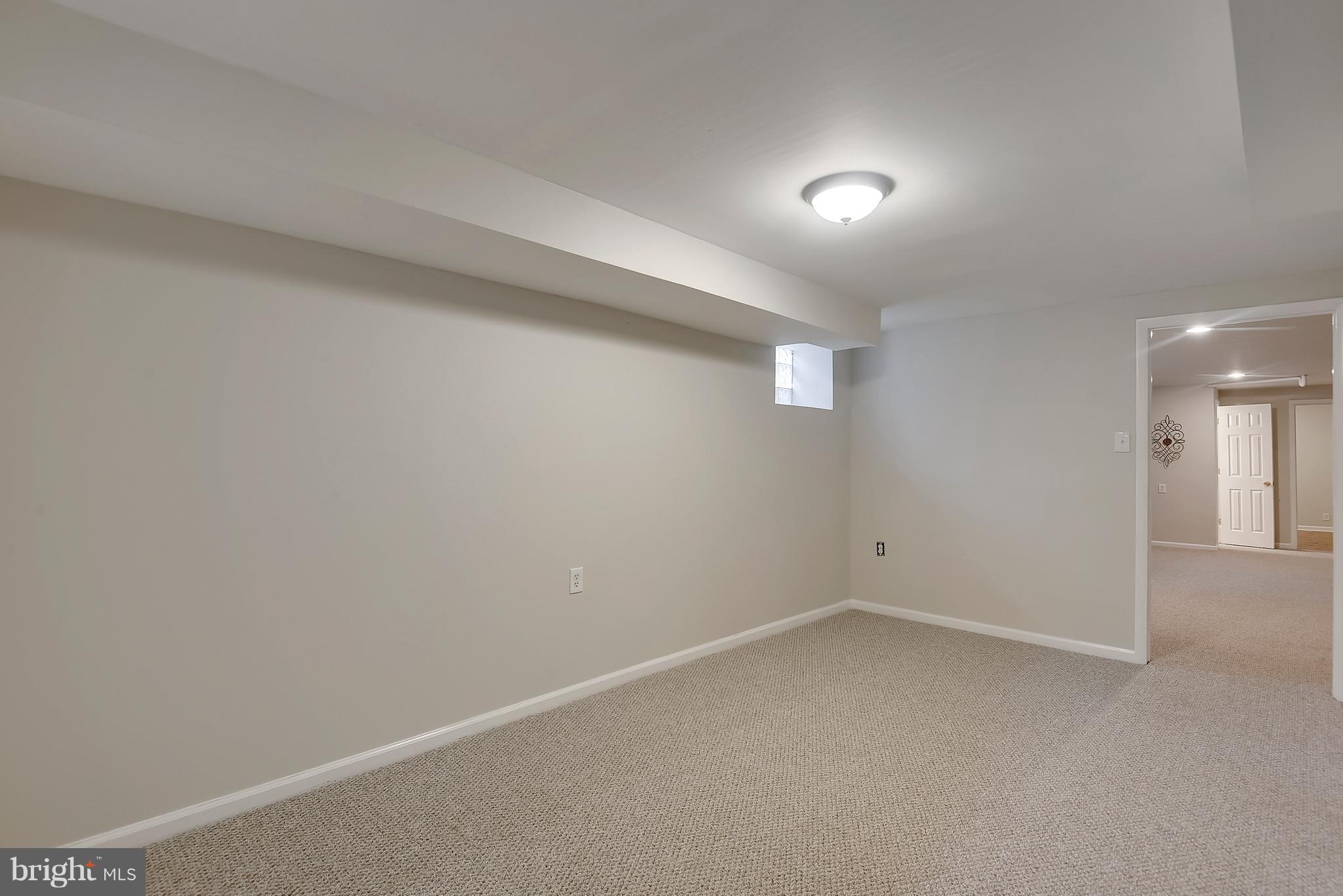 8615 Emory Grove Road Gaithersburg, MD 20877 - Photo 24 of 27 Game Room perfect for Pool - or maybe Gym Space?
