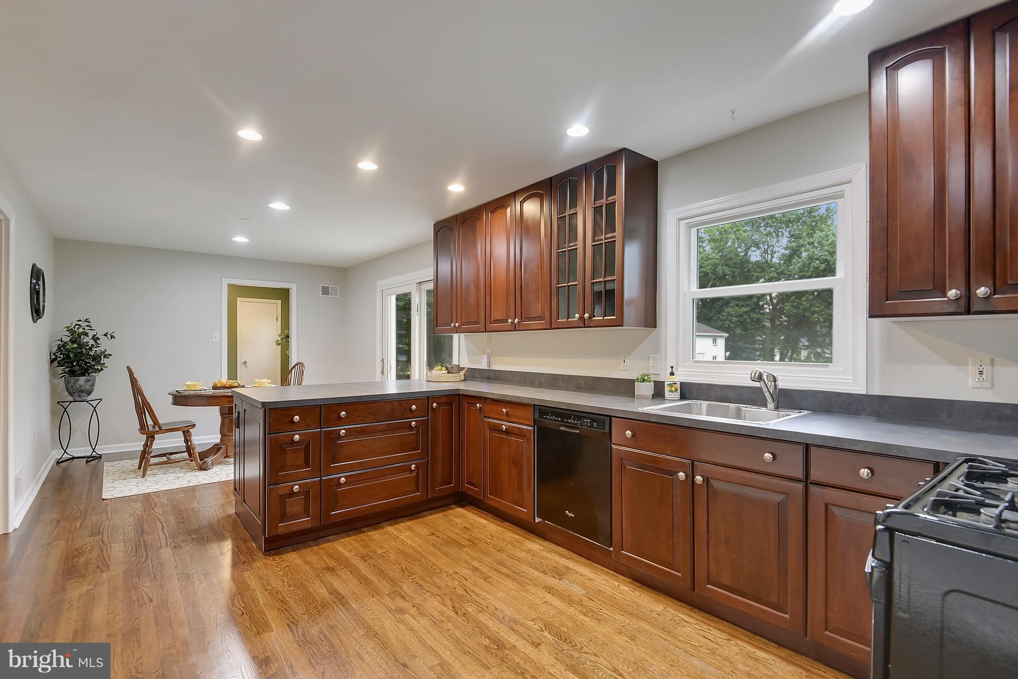 8615 Emory Grove Road Gaithersburg, MD 20877 - Photo 7 of 27 Wonderful open plan with breakfast room beyond