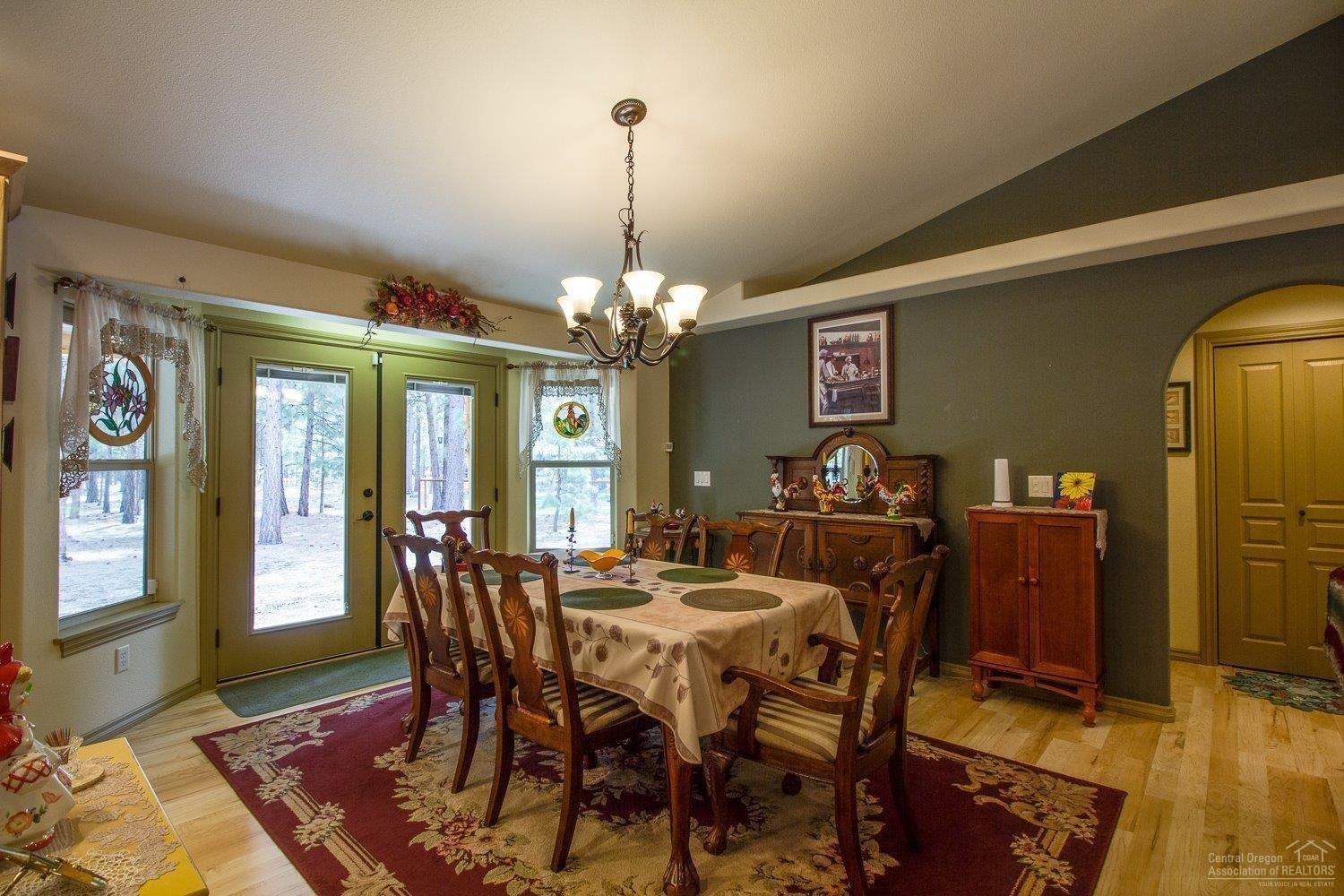 52078 Foxtail Road La Pine, OR 97739 - Photo 3 of 19 Large dining area with Pinecone Chandeli