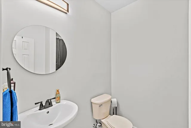 a view of house with outdoor space and sitting area