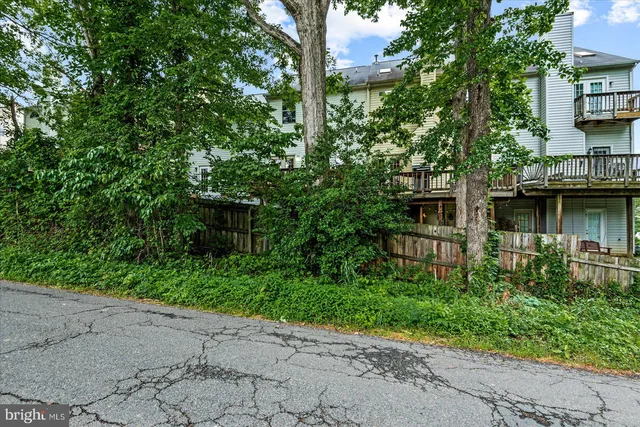 a picture of a bench in front of a door