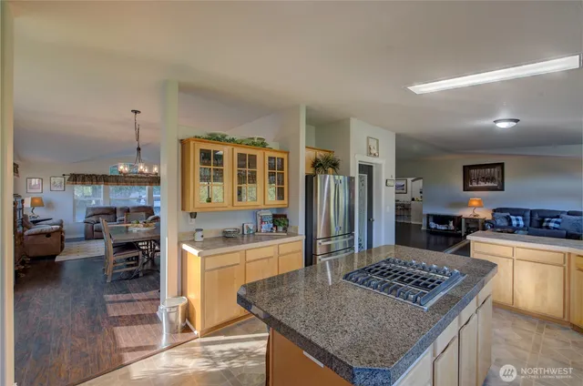 a kitchen with a stove a refrigerator and a stove