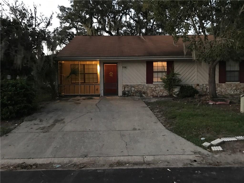 457 Hemlock Street Altamonte Springs, FL 32714 - Photo 1 of 1 a front view of a house with garden