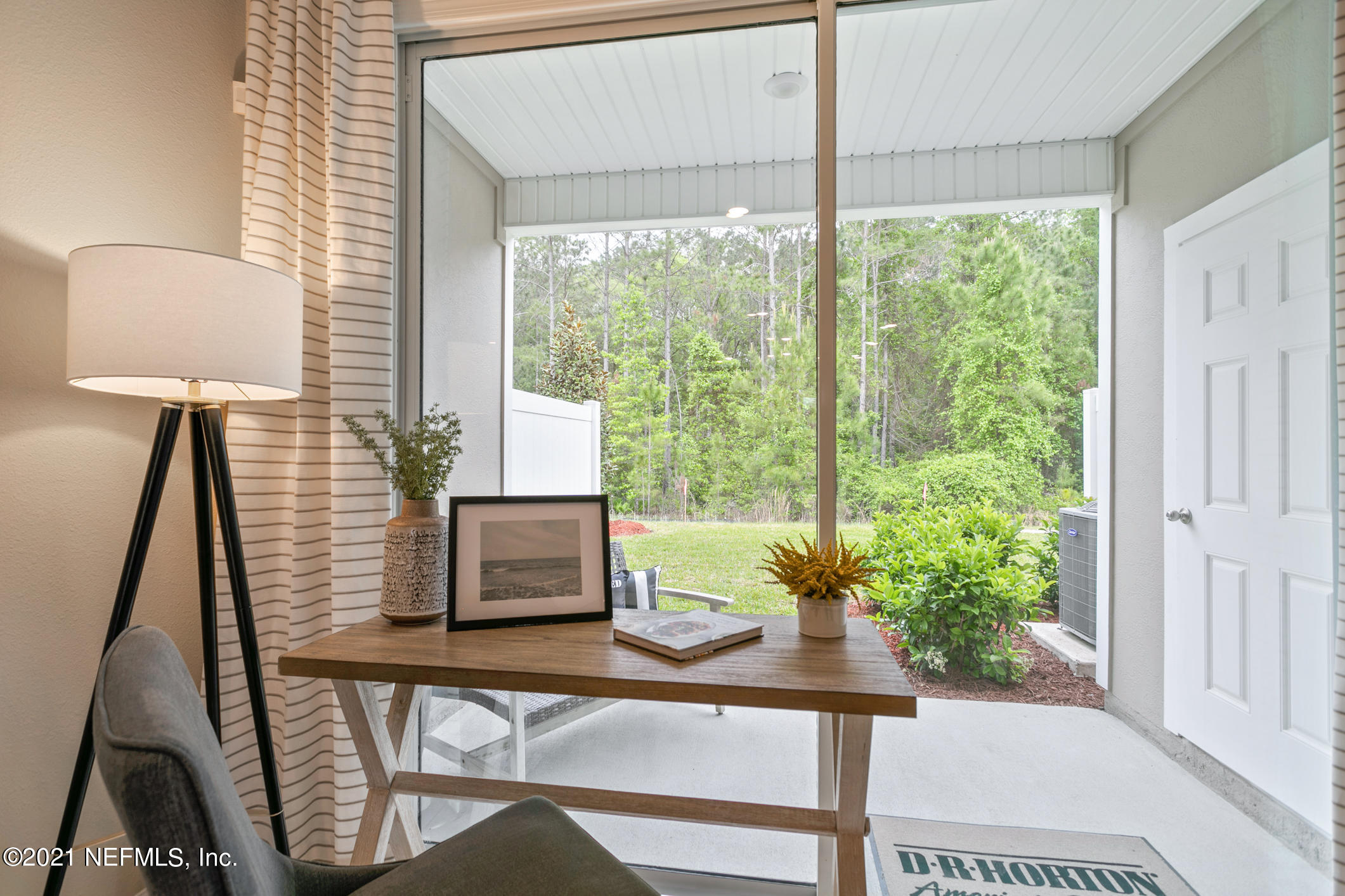 867 Rotary Road Jacksonville, FL 32211 - Photo 3 of 21 a view of a porch with a potted plant