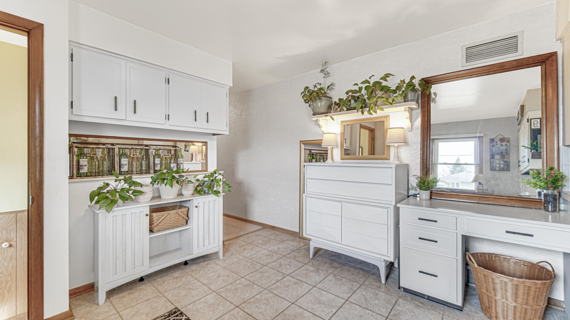 3232 Laporte Street Highland, IN 46322 - Photo 12 of 26 a kitchen with granite countertop white cabinets and window