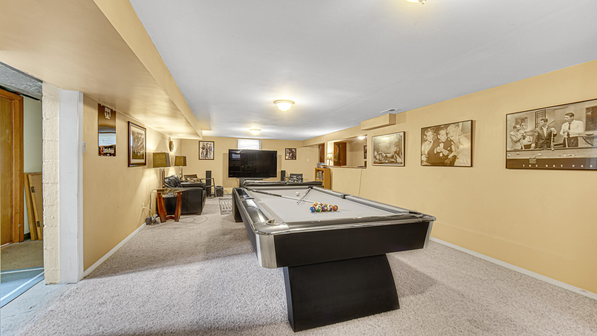 3232 Laporte Street Highland, IN 46322 - Photo 18 of 26 a room with furniture and a flat screen tv